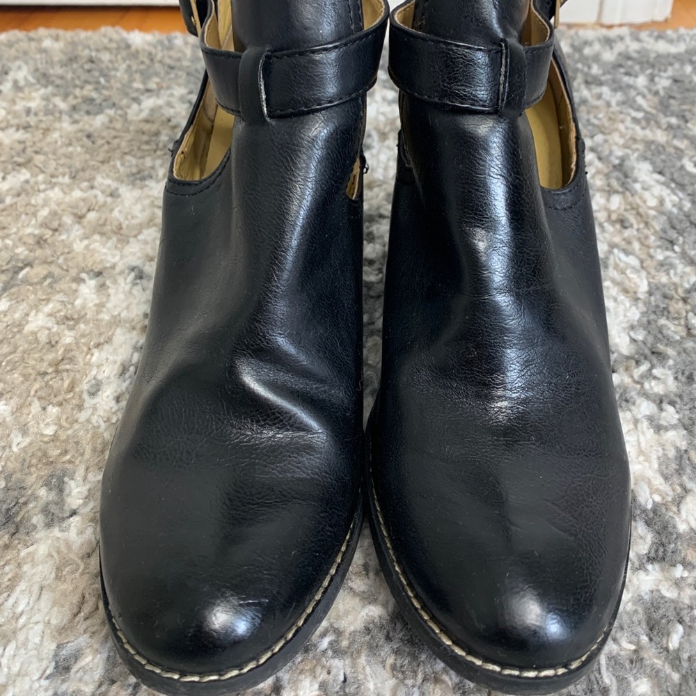 Nine West black leather cutout booties.